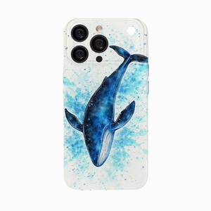 Whale in vibrant blue splashes